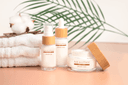 Glass bottles with natural skincare serums and essences